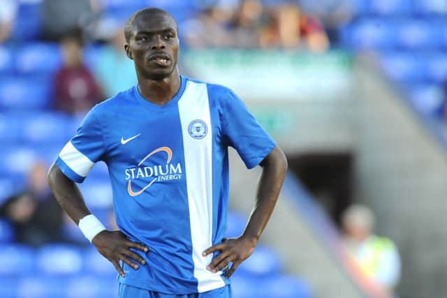 Posh centre-back Gaby Zakuani has been called up to DR Congo international squad.