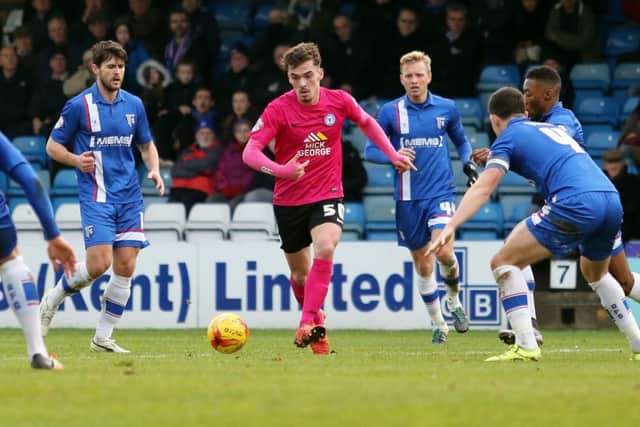 Harry Toffolo in action on his Posh debut at Gillingham. Photo: Joe Dent/theposh.com.