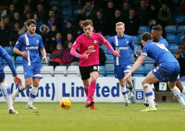 Harry Toffolo in action on his Posh debut at Gillingham. Photo: Joe Dent/theposh.com.