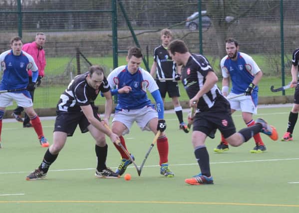 Action from a Bourne Deeping (dark shirts) game earlier this year. Photo: David Lowndes.