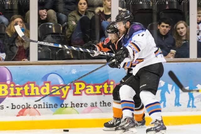Captain James Ferrara battles for the puck. Picture: Tom Scott