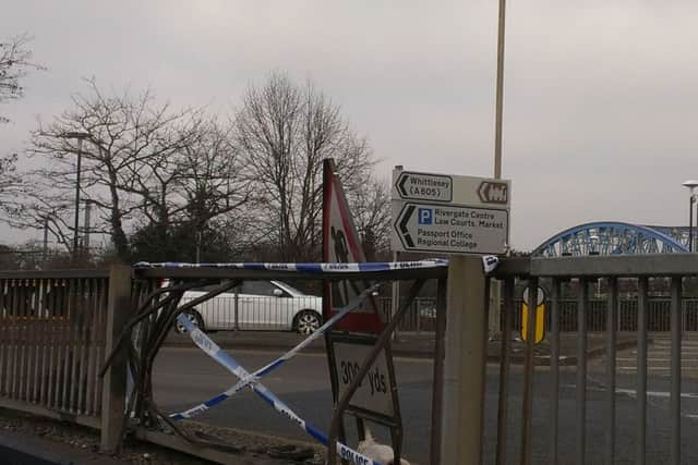 The scene at Queensgate roundabout this morning where the car went into the crash barrier