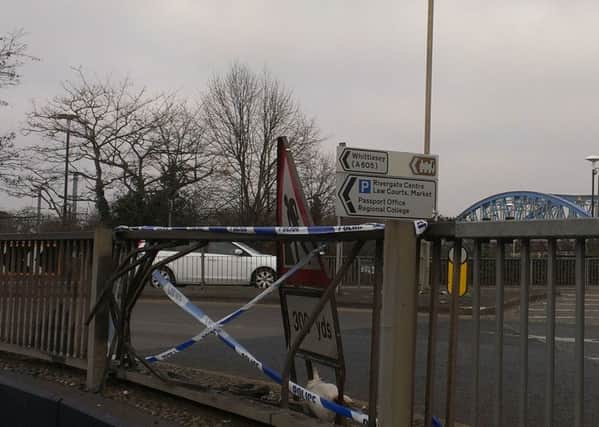 The scene at Queensgate roundabout this morning where the car went into the crash barrier