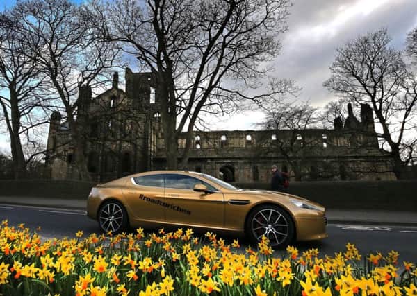 Don't miss the Gold Aston Martin touring north Cambridgeshire this morning