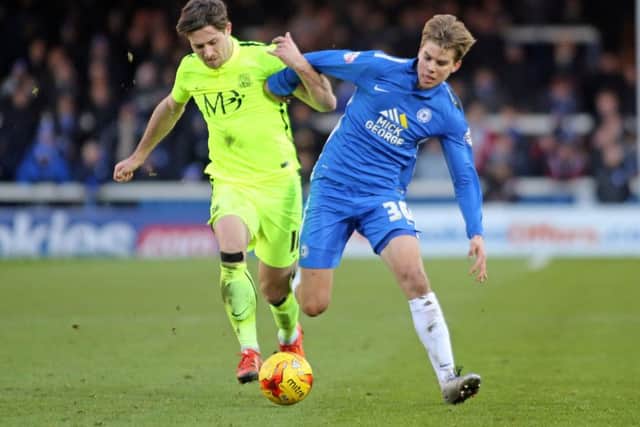 On-loan midfielder Martin Samuelsen (right) is fit and available for Posh at Doncaster. Photo: Joe Dent/theposh.com.