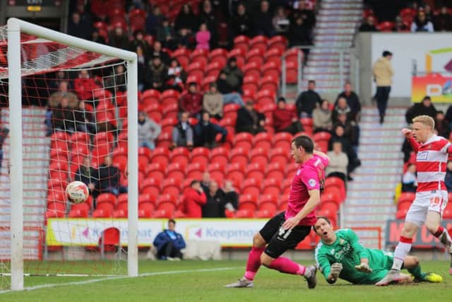 Aaron Williams equalises for Posh at Doncaster. Photo: Joe Dent/theposh.com.