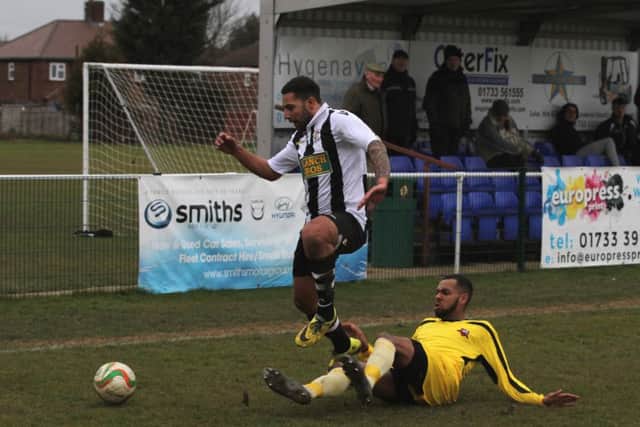 Louie Medwynter (stripes) in action for Peterborough Northern Star against Leicester Nirvana. Photo: Tim Gates.