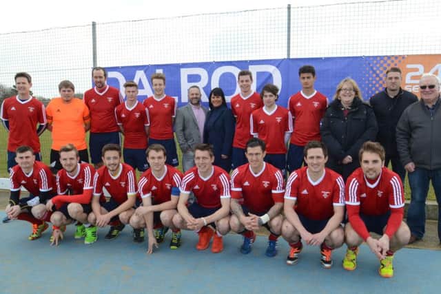 DALROD managing director David Lane (centre, back row) with the City of Peterborough Hockey Club team, and sports club officials, before a HA Cup semi-final with Beeston. Photo: David Lowndes.