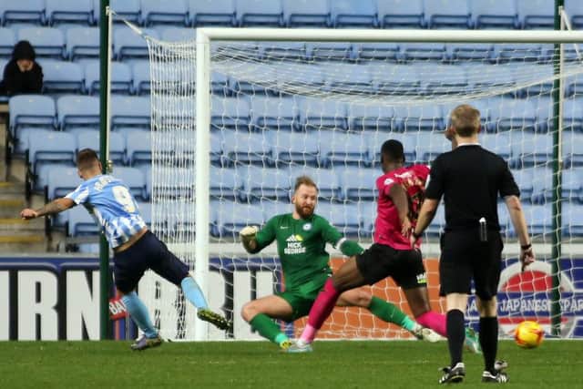 Adam Armstrong scores the winning goal for Coventry against Posh earlier this season. Photo: Joe Dent/theposh.com.
