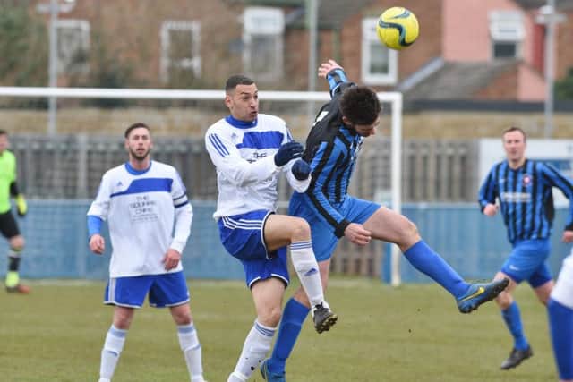 Action from Peterborough Sports Reserves v Whittlesey Athletic (blue) at PSL. Photo: David Lowndes.