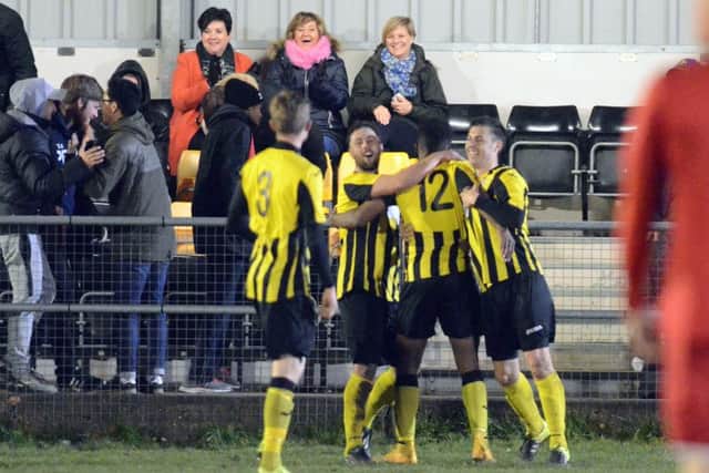Holbeach celebrate scoring their second goal. Picture: Tim Wilson