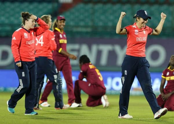 Charlotte Edwards (right) celebrates at the World Twenty/20 Cup.