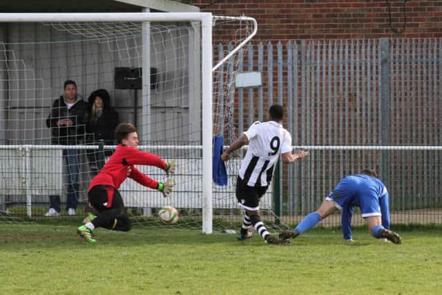 Jezz Goldson-Williams scores for Peterborough Northern Star in their 3-0 win over Yaxley. Photo: Tim Gates.