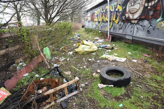 Litter and fly-tipping problema around GN Cottages at Millfield. EMN-160318-180344009