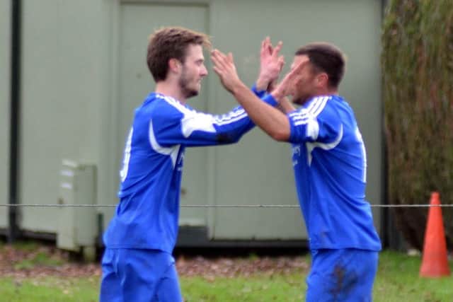 Ollie Maltby (left) scored for Moulton Harrox at AFC Stanground.