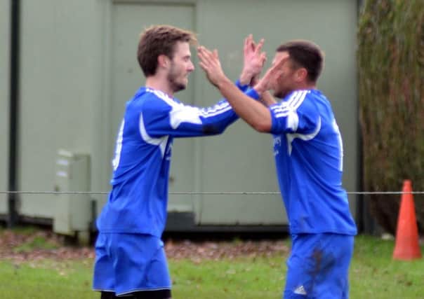 Ollie Maltby (left) scored for Moulton Harrox at AFC Stanground.