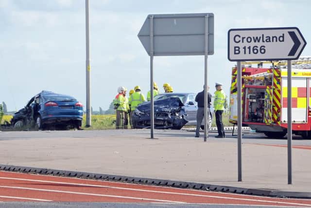 The scene of a fatal three-car collision at the "staggered junction" of the A16 junction with the B1166 Hulls Drove  in Crowland where an 81-year-old woman died and three other people were injured, one seriously, in May 2015.  Photo by Tim Wilson.