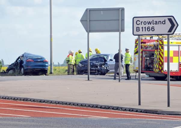 The scene of a fatal three-car collision at the "staggered junction" of the A16 junction with the B1166 Hulls Drove  in Crowland where an 81-year-old woman died and three other people were injured, one seriously, in May 2015.  Photo by Tim Wilson.