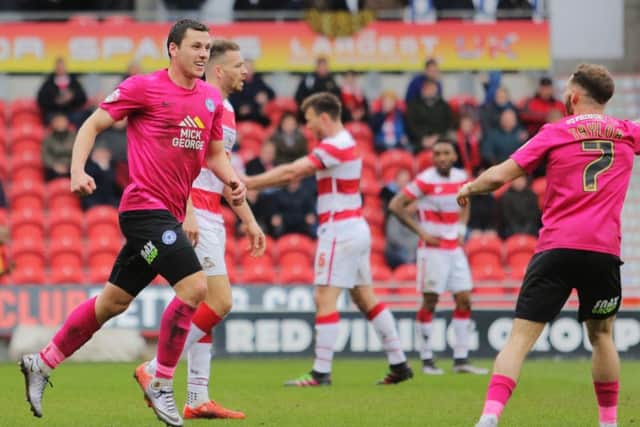 Aaron Williams is all smiles after scoring for Posh at Doncaster. Photo: Joe Dent/theposh.com.