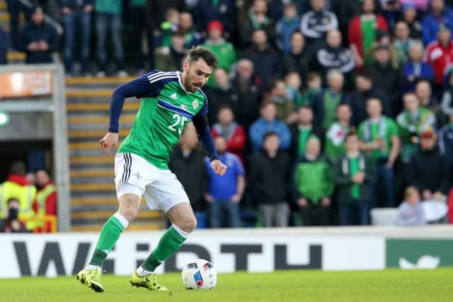 Posh full-back Michael Smith in action for Northern Ireland against Slovenia in Belfast.