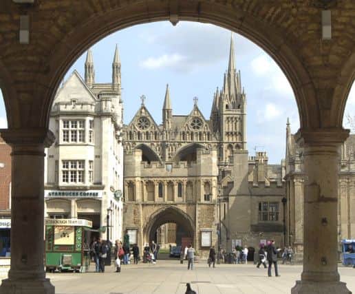 Peterborough Cathedral seen through Arches of Guildhall ENGANL00120110222110216
