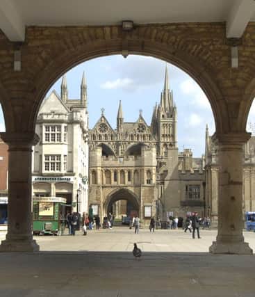 Peterborough Cathedral seen through Arches of Guildhall ENGANL00120110222110216