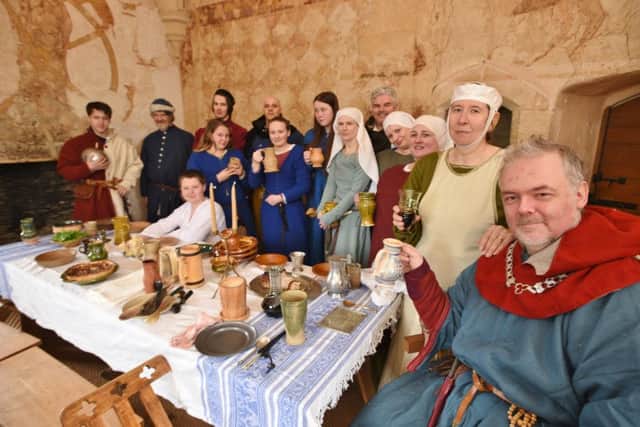 Members of the Medieval Sokemen who have taken over Longthorpe Tower for the weekend EMN-160204-114052009