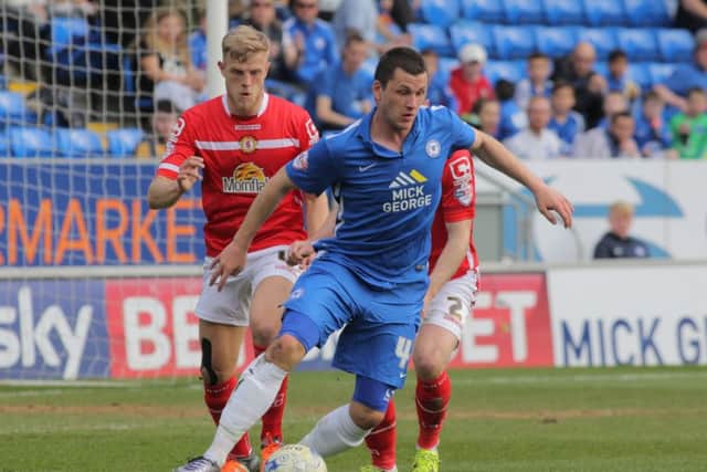 Posh striker Aaron Williams has possession of the ball on the edge of the Crewe penalty area. Photo: Joe Dent/theposh.com.