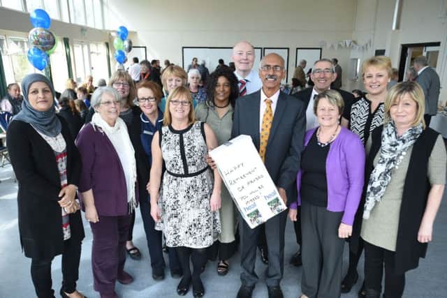 Dr Koneru Prasad with his partners and staff at his retirement from Westwood Clinic. EMN-160204-113610009