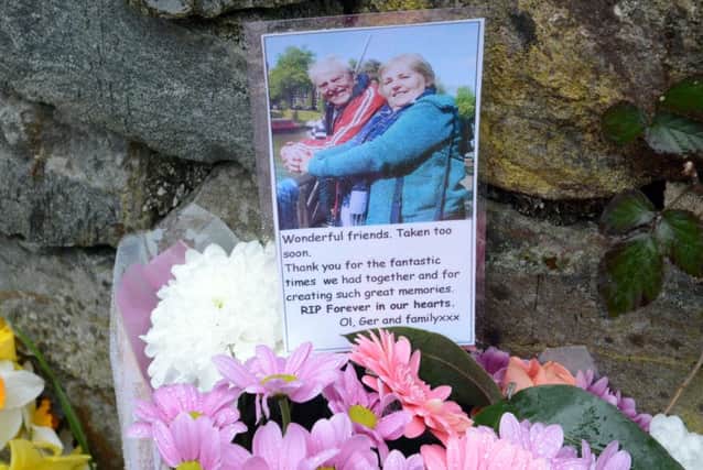 Flowers at the scene of the crash on the A499 by Llandwrog where two people died. Pic: Daily Post Wales
