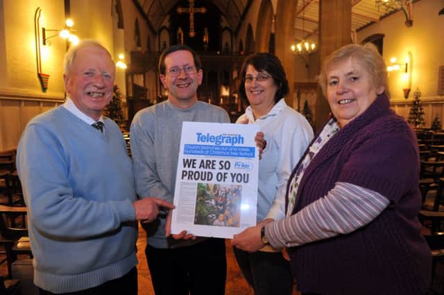 Jan Stephens (far right) receiving a Pride in Peterborough award in 2011 for the events and fundraising committee at All Saints church, Park Road, for raising over Â£900 from the Christmas tree festival. From left, Michael Peters, Roger Cousins and Deirdre Wellham  ENGEMN00120111223120918
