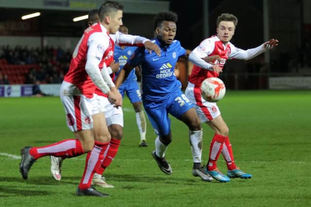 Posh forward Shaquile Coulthirst battles for possession at Fleetwood. Photo: Joe Dent/theposh.com.