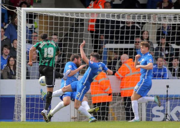 Nathaniel Mendez-Laing of Rochdale scores his side's second goal of the game. Picture: Joe Dent