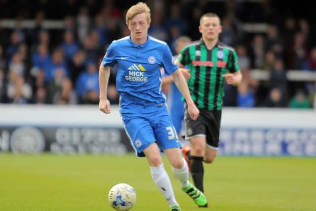 Chris Forrester of Peterborough United brings the ball forward. Picture: Joe Dent