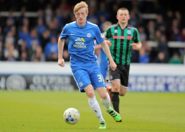Chris Forrester of Peterborough United brings the ball forward. Picture: Joe Dent