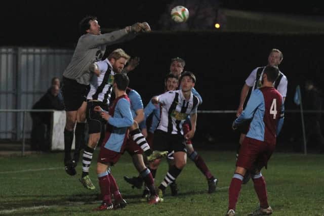Goalmouth action from last night's Hinchingbrooke Cup semi-final. Picture: Tim Gates