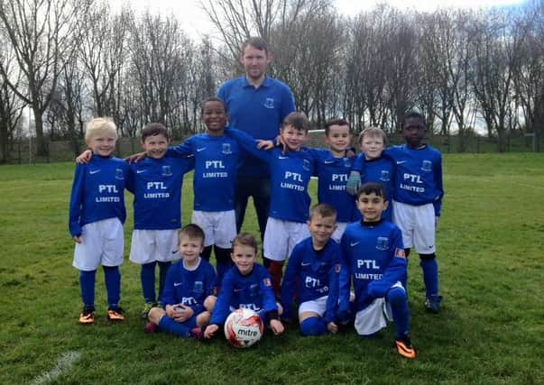 The Bretton North End Under 6/Under 7 team in sponsored kit supplied by Peterborough Tail Lifts.
