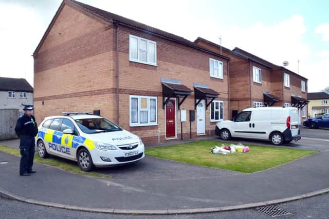 Police outside the house where Elizabeth Edwards and her 13-year-old daughter Katie were murdered. ANL-160417-120510001