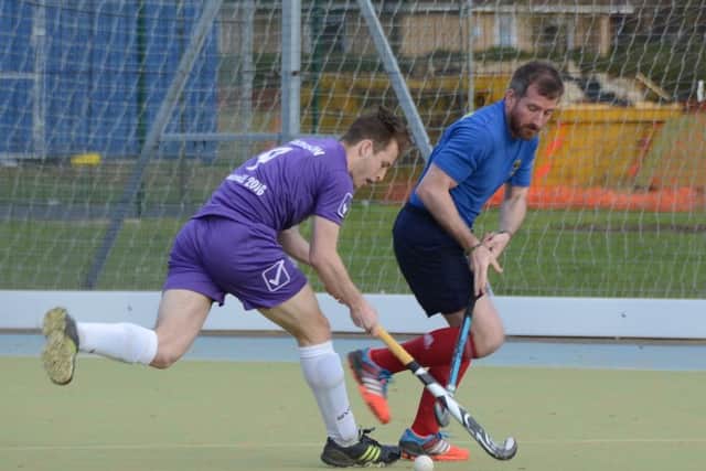 Action from the Roger Brummitt Mixed Hockey Trophy Final between winners Camp Retro (purple) and Ragamuffins. Photo: David Lowndes.