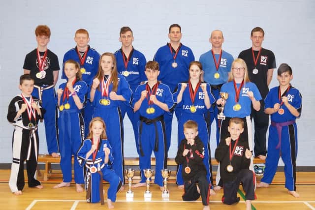 Pictured are Peterborough BCKA fighters who did well in recent competitions. From the left they  are, back, Sam Spencer, Zac Culpin, Leon Gold, Colin Lock, Simon Munday, Bradley King, middle, Ashton Brannigan, Kelsey Lock, Abi Daulton, Eddy Paddock, Jaden Harris, Freya Molloy, Nicolas Shacallis, front, Hannah Cameron, Harvey King and Leon King.