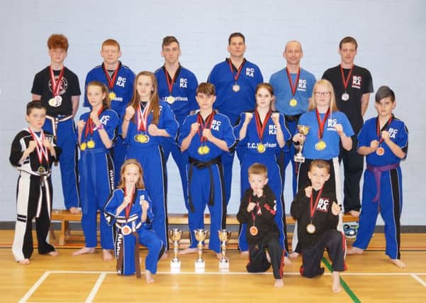 Pictured are Peterborough BCKA fighters who did well in recent competitions. From the left they  are, back, Sam Spencer, Zac Culpin, Leon Gold, Colin Lock, Simon Munday, Bradley King, middle, Ashton Brannigan, Kelsey Lock, Abi Daulton, Eddy Paddock, Jaden Harris, Freya Molloy, Nicolas Shacallis, front, Hannah Cameron, Harvey King and Leon King.