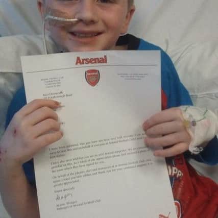 Rico with his letter from ArsÃ¨ne Wenger