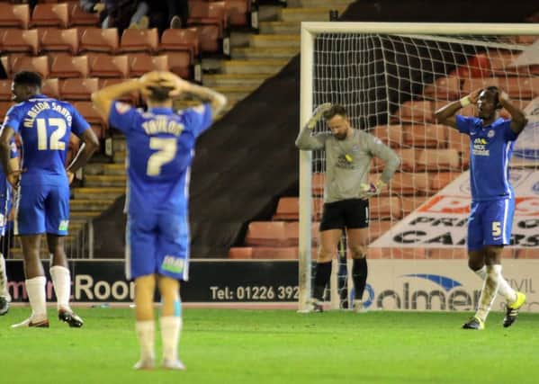 Posh 'keeper Ben Alnwick can't believe he's conceded an injury time winning goal at Barnsley. Photo: Joe Dent/theposh.com.