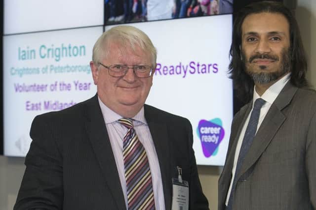 HONOUR: Iain Crighton, Crightons of Peterborough, left, with Thomas Todd, of award sponsor Citi.