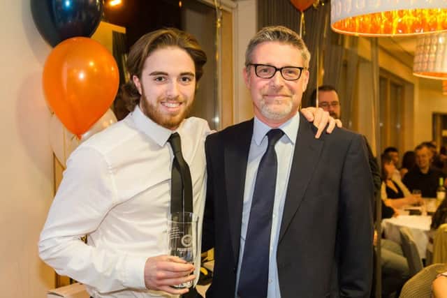 James White (left) receives an award from Phil Smith, chairman of Phanforce, the Phantoms Supporters club. Picture: Tom Scott