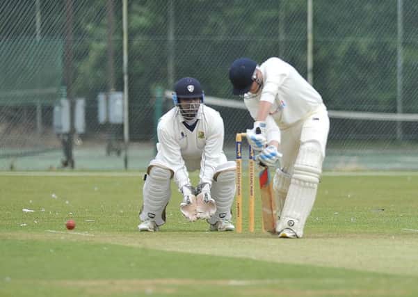 Tim Young (batting) will keep wicket for Cambs against Norfolk. Photo: David Lowndes.