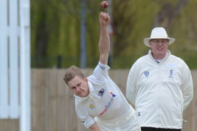 David Sayer bowling for Peterborough Town against Wollaston. Photo: David Lowndes.