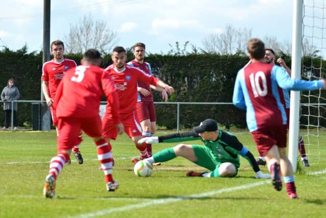 Action from Deeping Rangers' 3-1 defeat at home to Boston Town. Photo: Tim Wilson.