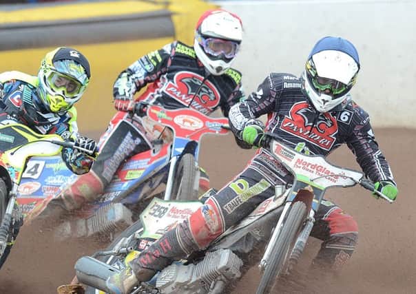 Emil Grondal (right) and SImon Lambert (centre) in action in heat 14 against Somerset. Picture: David Lowndes