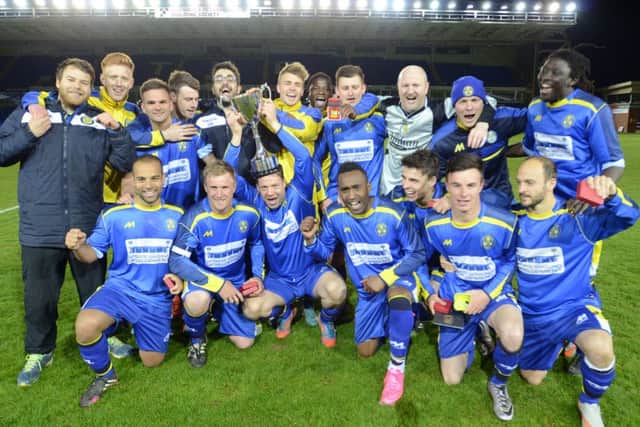 Peterborough Sports celebrate their Northants Junior Cup Final success at the ABAX Stadium. Photo: David Lowndes.